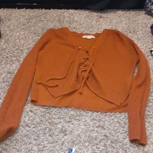 A cropped sweater